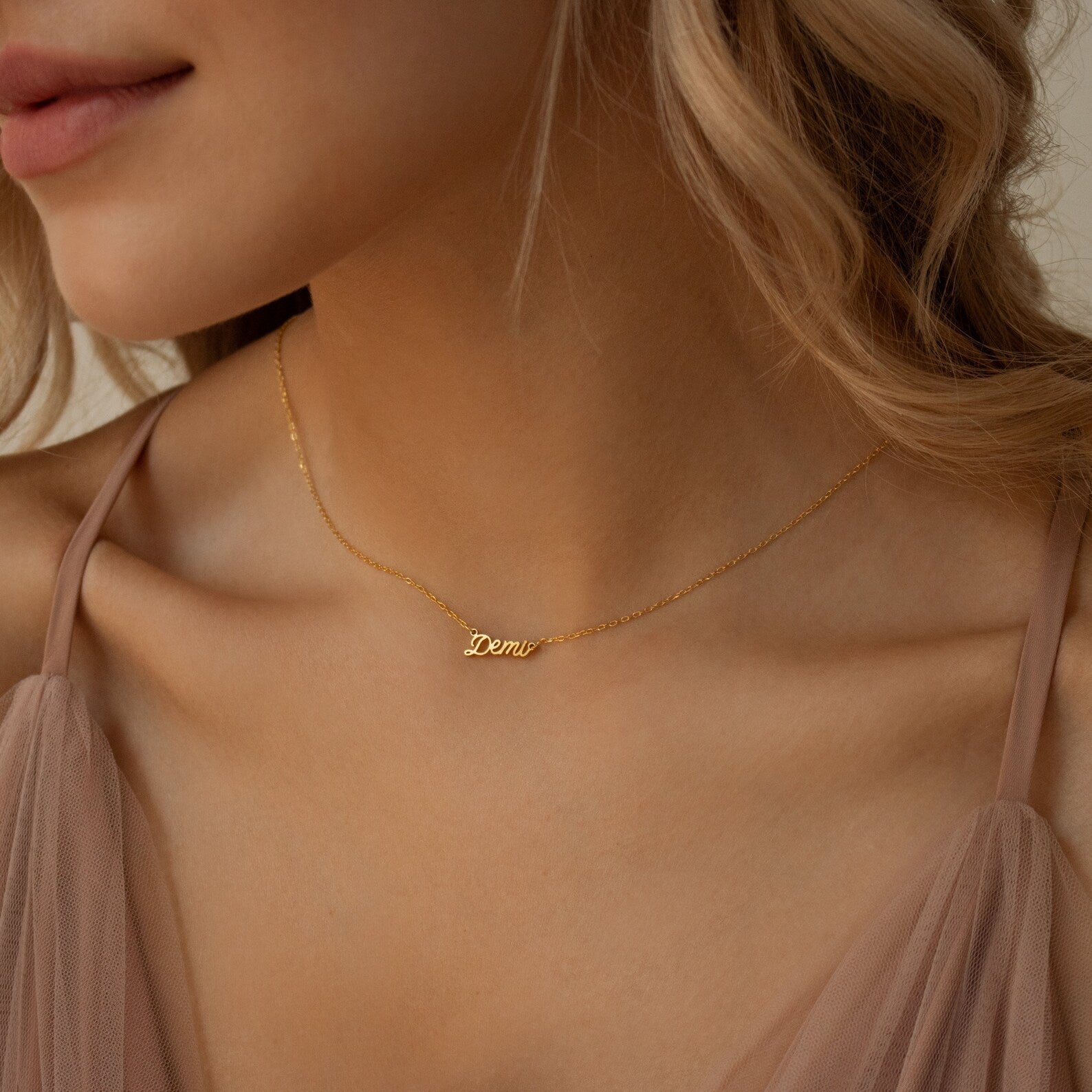 Tiny Paris Name Necklace in elegant 18K gold, rose gold and sterling silver featuring a delicate personalized name pendant on a fine chain β a minimalist and chic everyday accessory.